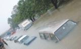 Parked vehicles in Guwahati under flood waters