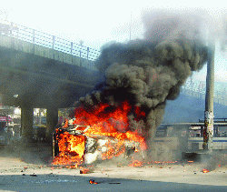 The burning wreck of what used to be a car(UB photos) One of the Blast Scenes at Guwahati