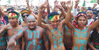 Tribal youth under the banner of ‘Twipra land statehood demand co-ordination committee’ demanding separate state for indigenous people of Tripura. file photo
